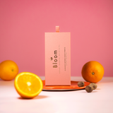 Pink box labeled 'Bloom' incense